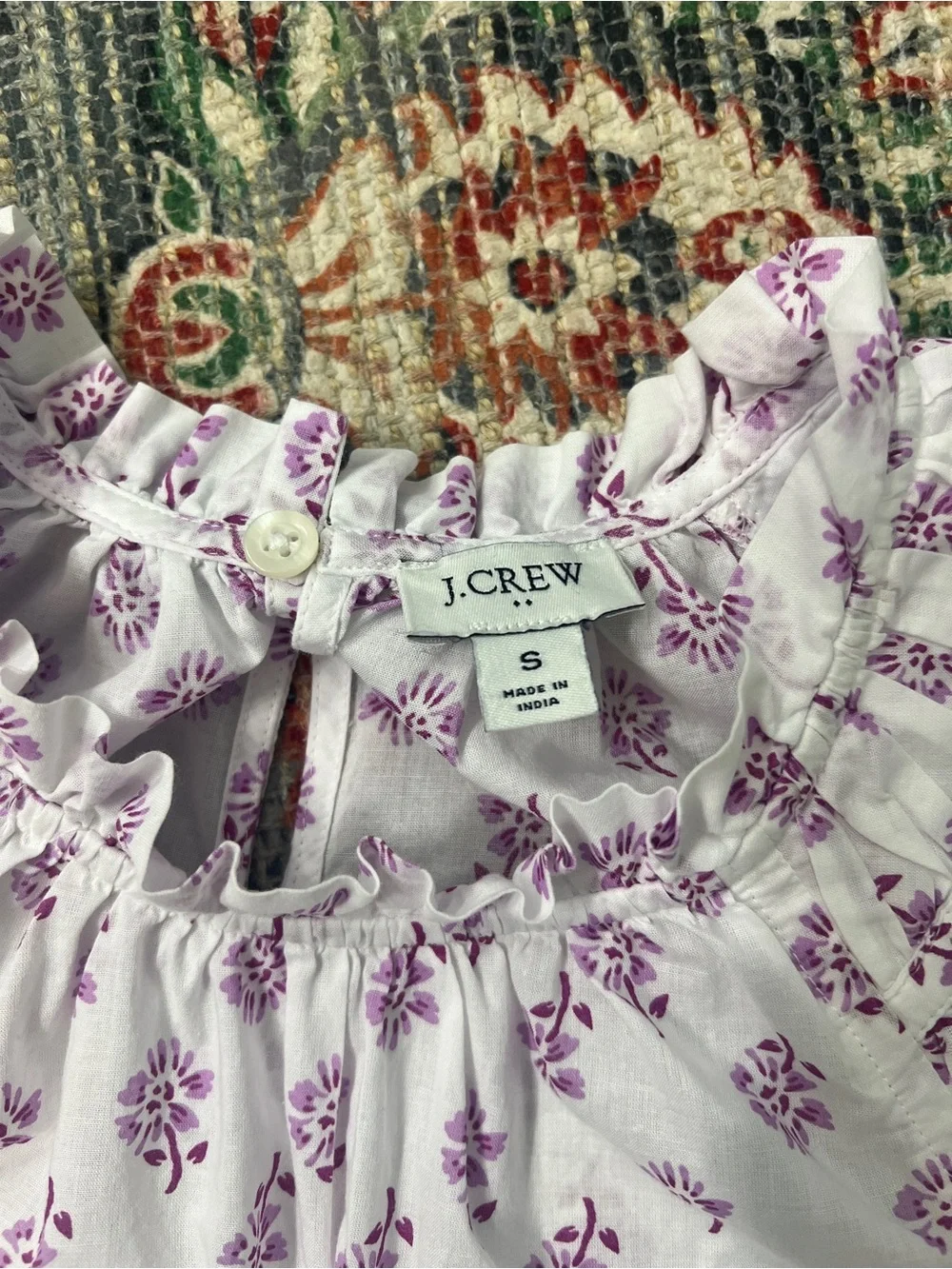 J.Crew Factory flutter-sleeve top features a white base with a purple floral